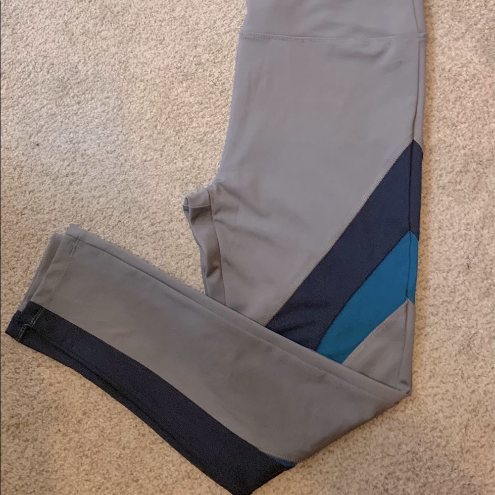 New. Sport leggings with through see designs.